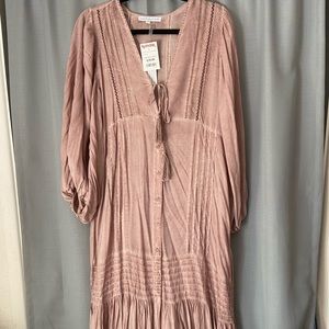 Women’s midi length dress.